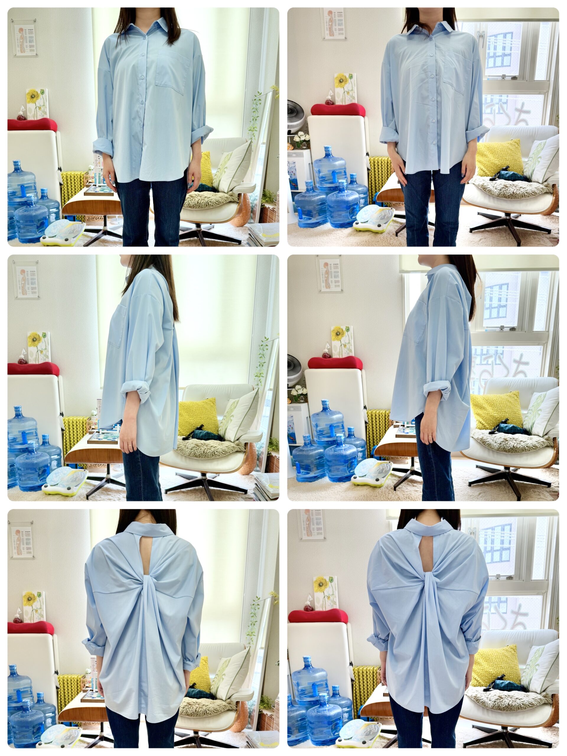 Person wearing an oversized light-blue button-down shirt with sleeves rolled, standing in a bright room